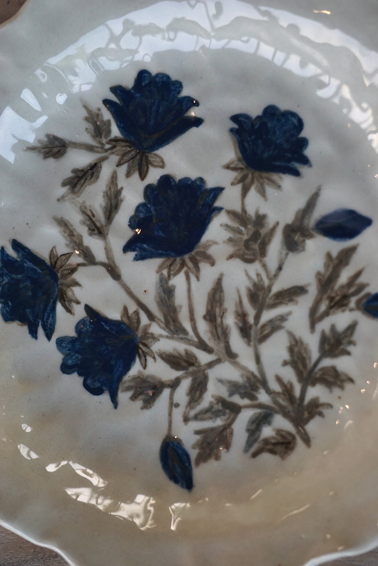 Blue floral wonky side plate