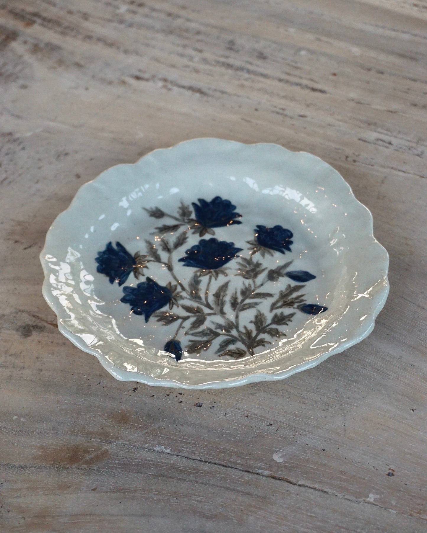 Blue floral wonky side plate