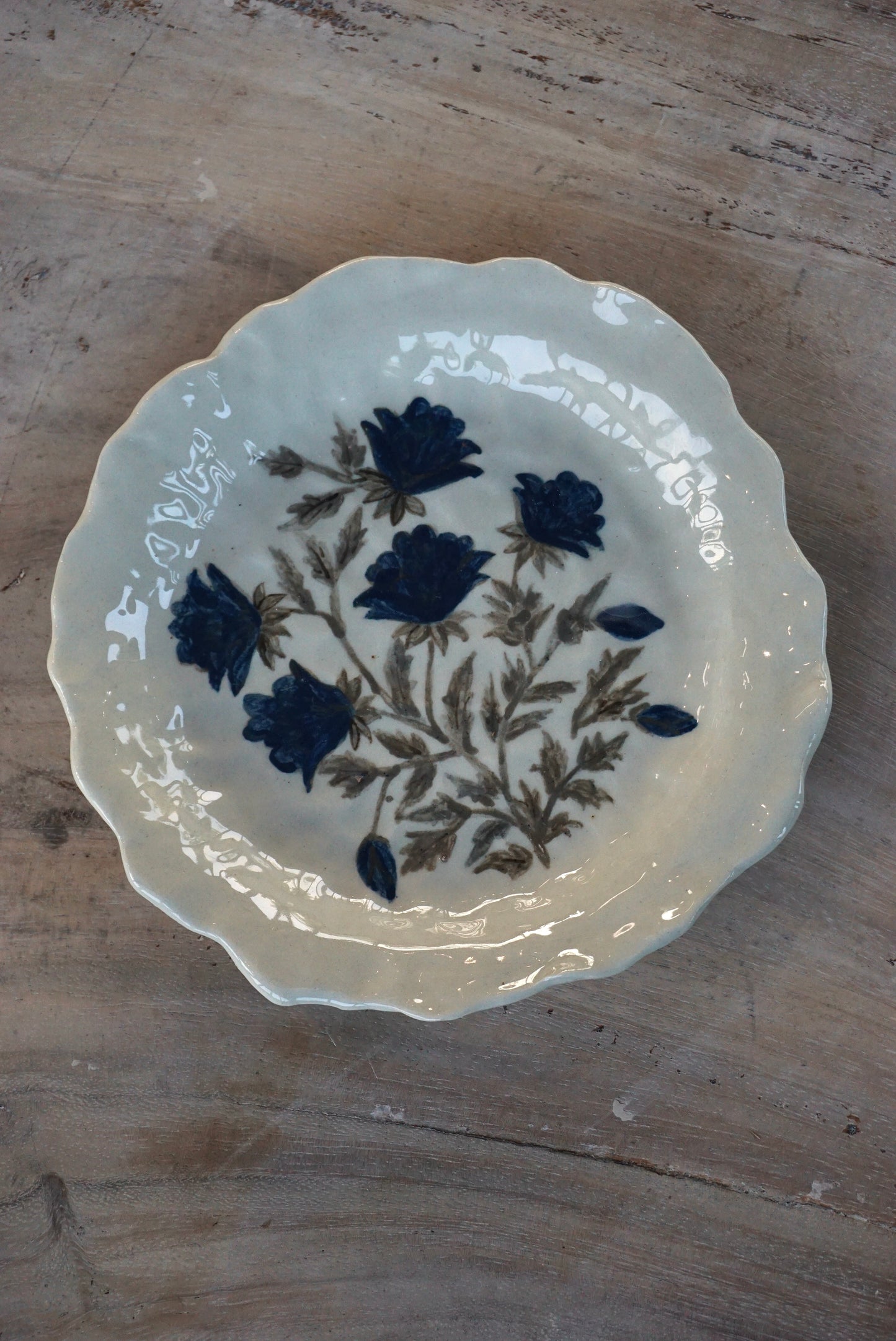 Blue floral wonky side plate