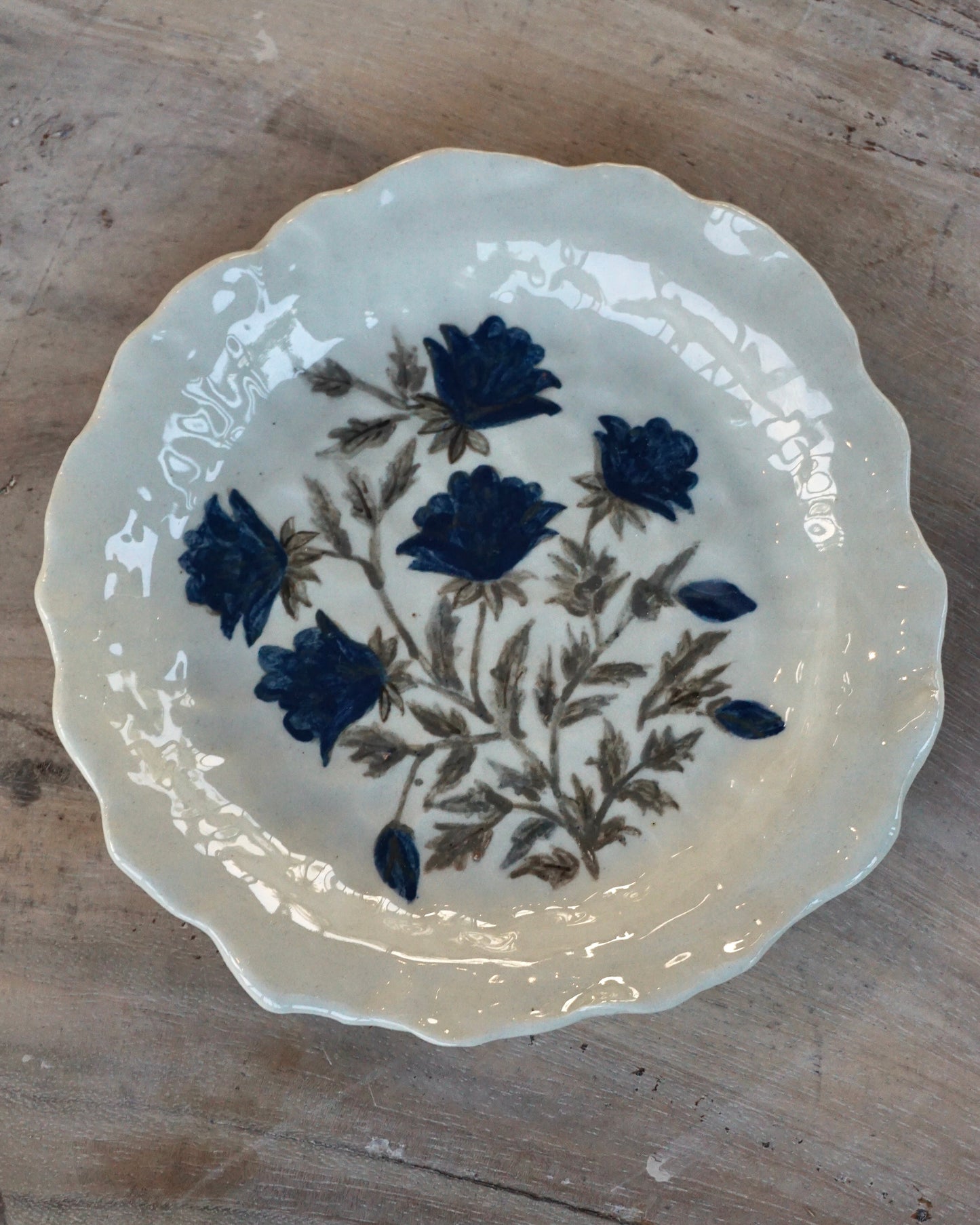 Blue floral wonky side plate